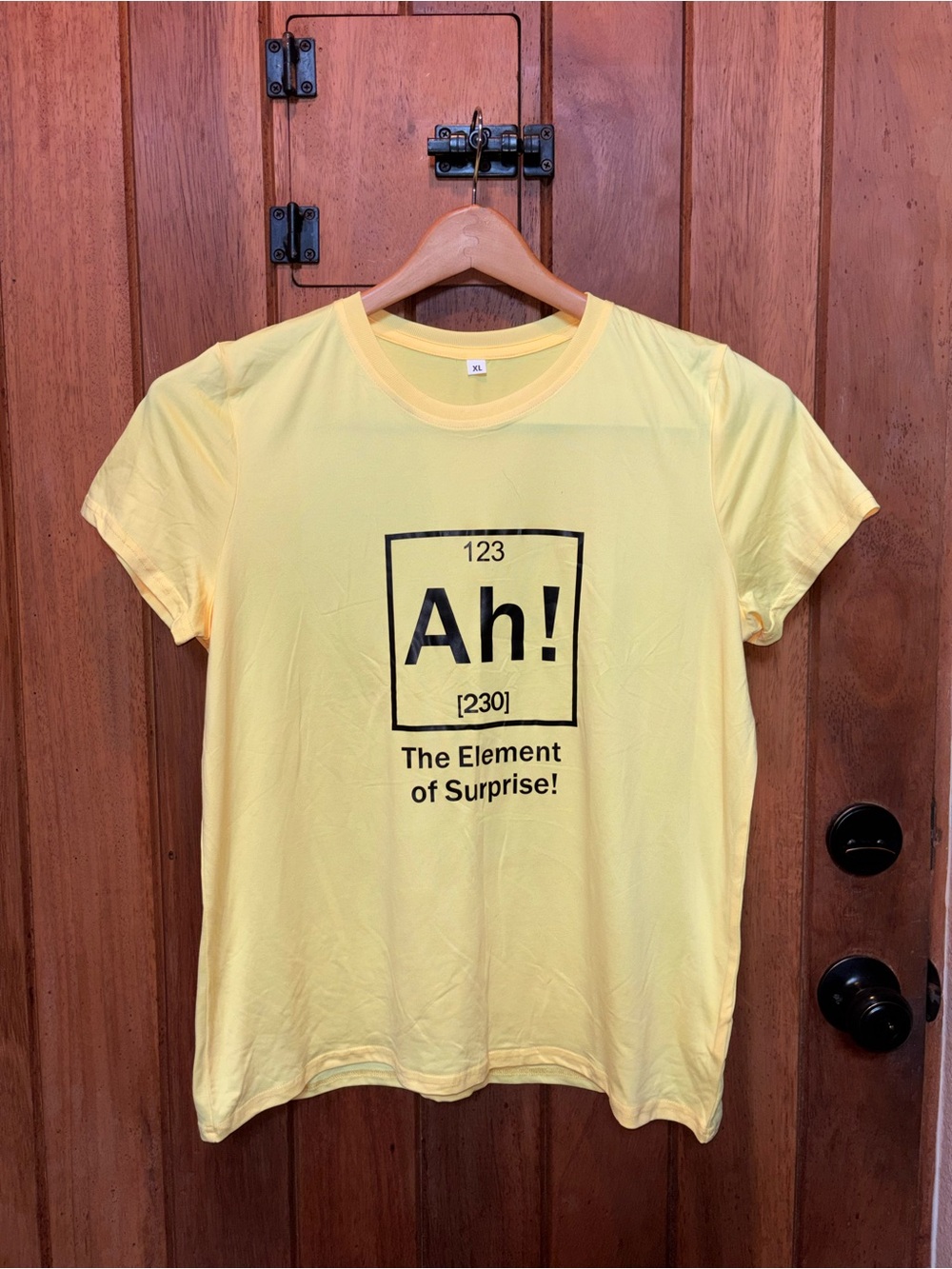 Yellow Crew Neck Graphic Tee "Ah! The Element of Surprise"